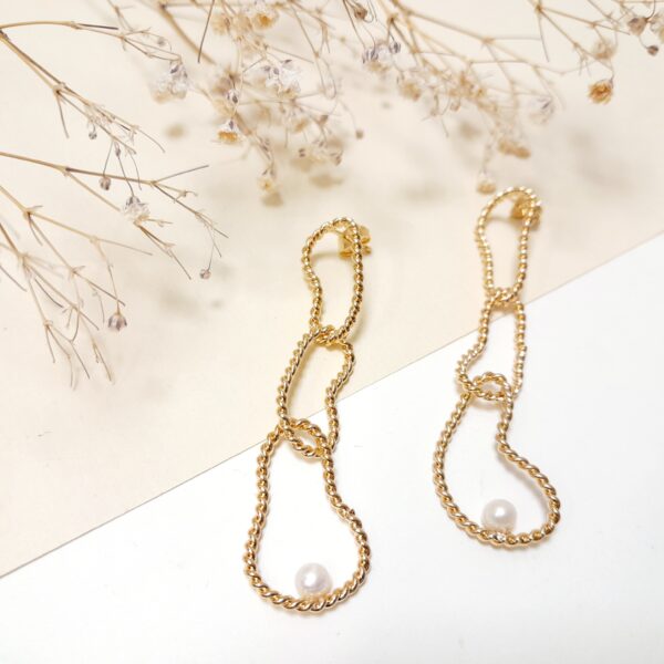 Boucles d'oreilles Dali et perle